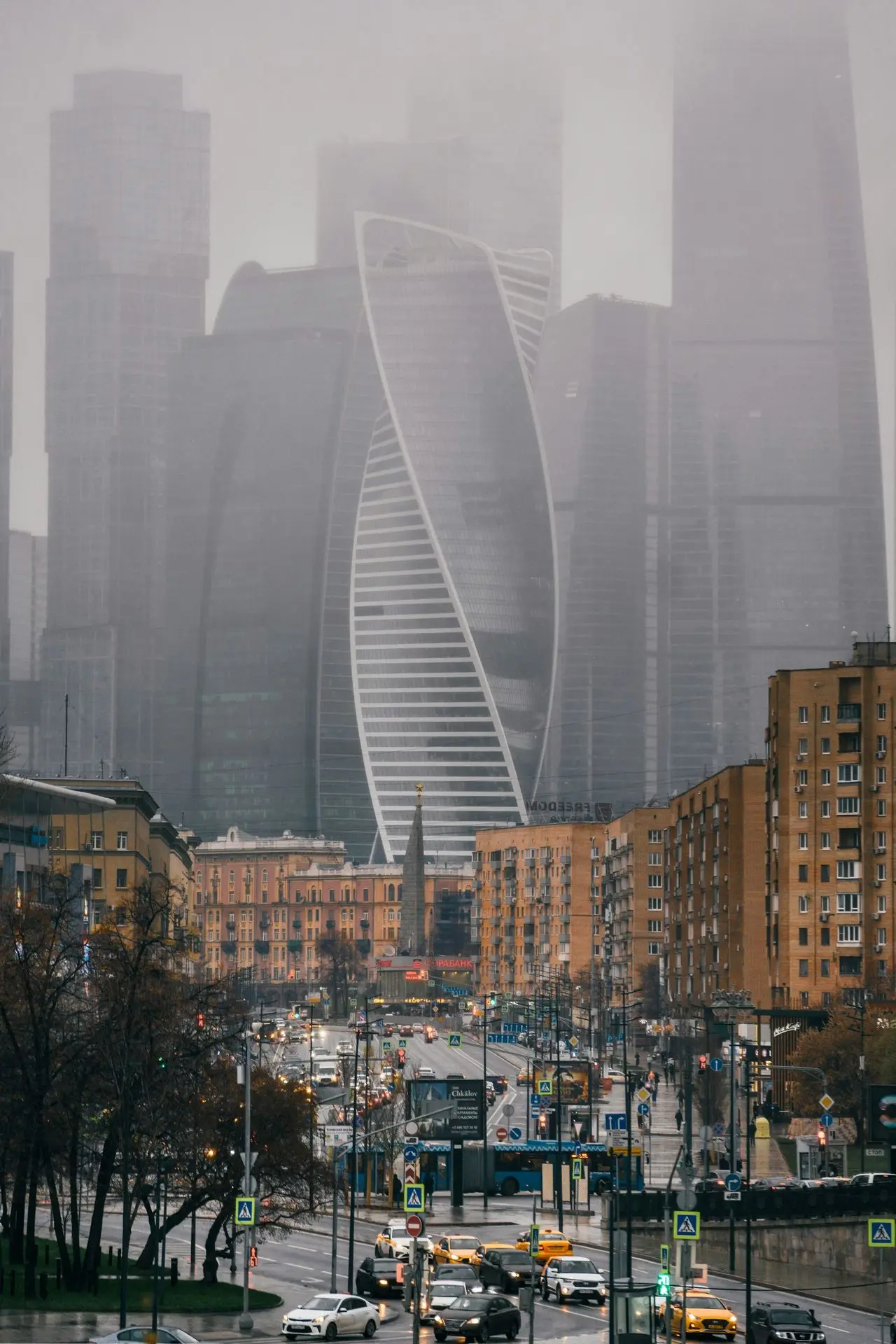 a city with tall buildings in the background